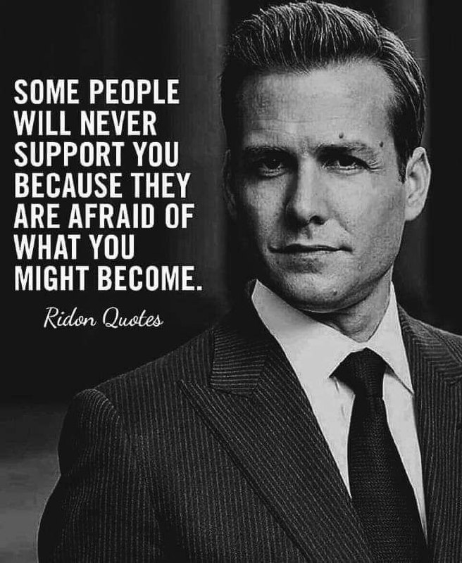 a man in a suit and tie with a quote on it